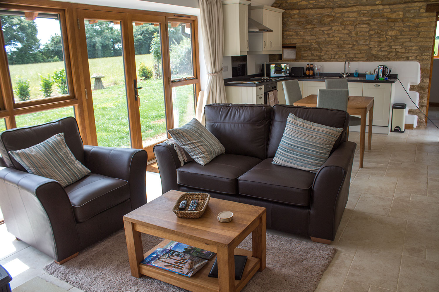 The finished living and kitchen area with the view of the outside.