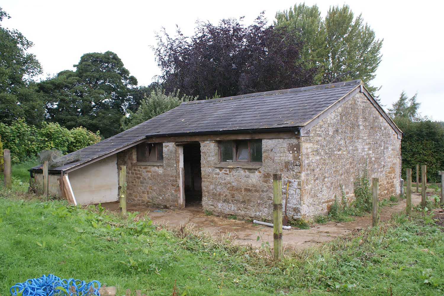 An image of the shed before work started.